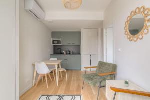 Appartements Appartement neuf, clim et parking, Caluire-Dombes : photos des chambres