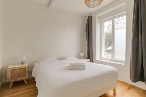 Appartements Appartement neuf, clim et parking, Caluire-Dombes : photos des chambres