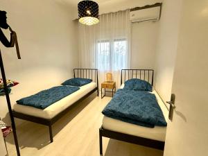 Ferienwohnung mit 2 Schlafzimmern, Strandnähe & voll ausgestattet