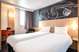 Hotels ibis Saint-Denis Stade Ouest : photos des chambres