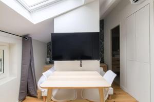 Appartements Studio neuf, clim et parking, Cite Internationale : photos des chambres