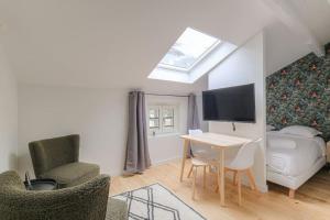 Appartements Studio neuf, clim et parking, Cite Internationale : photos des chambres