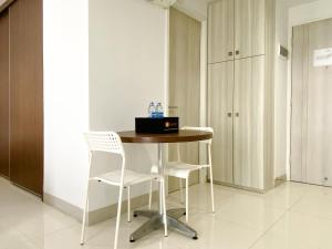 Cozy and Nice Studio at Azalea Suites Apartment By Travelio