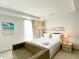 Cozy and Nice Studio at Azalea Suites Apartment By Travelio