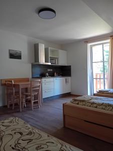 Apartmány u lesa