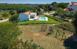 Villa Lia for 6 people near Pula with children playground and private pool