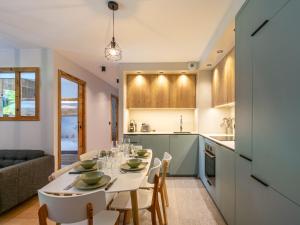 Cocon intime avec WiFi et garage au pied des pistes – résidence neuve de standing - FR-1-694-338