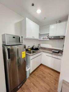 1BR By The Airport at Amani Grand Residences