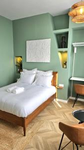 Maisons d'hotes Maison d'exception proche gare - La Maison Des Petits Sablon : photos des chambres