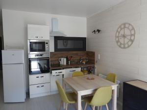 Appartements les volets bleus : photos des chambres