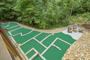 Poolin Around: Mini Golf Pool Theater Firepit