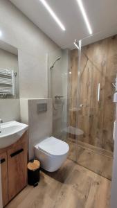 Wrzosowe Wzgórze 5 - Mały Apartament z Wanną