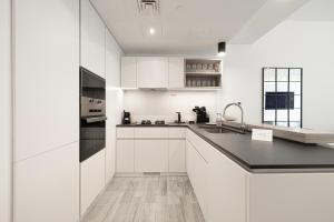 Sophisticated 1BR with Pool View in Belgravia Square JVC