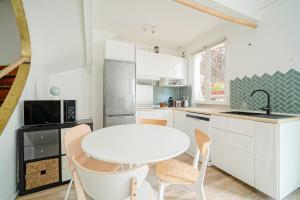 Appartement idéal famille, en duplex et au calme, au pied du métro "Mairie de Saint Ouen"