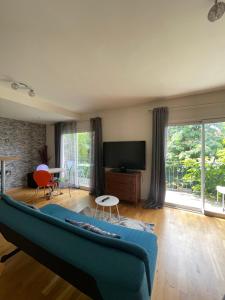 Appartement cosy et spacieux avec une belle vue sur jardin, proche des commodités et à moins de 30 minutes de Paris en transport