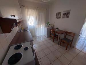 Elenis Apartments Igoumenitsa - Γκαρσονιέρα 2ου ορόφου επιπλωμένη, εξωπλισμένη
