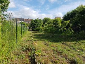 Maisons de vacances 4 Ch - 10 pers - Grande Maison - Parking - Jardin - BBQ : photos des chambres