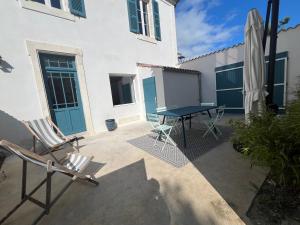 Villas Maison vue sur mer paisible : photos des chambres