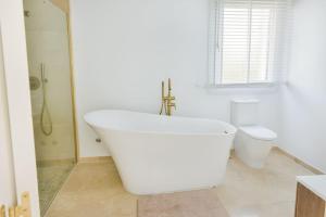 Dream beach-side villa with sea views & close to golf