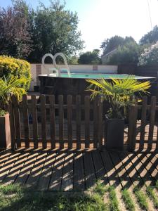 Sejours chez l'habitant ESCALE AU FOND DU JARDIN : photos des chambres