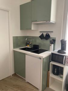Appartements Studio centre ville proche RER A wifi : photos des chambres