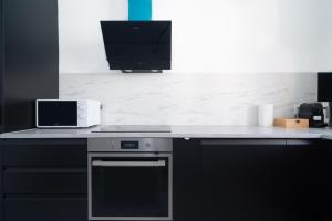 Appartements Fourside Deluxe Apartments in Le Bourget : photos des chambres