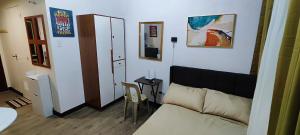 Happy Homestay at Fullerton Suites Condo near Nuvali and Tagaytay