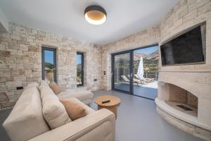 Luxury Stone Villa Aris, ideally located just a 5-minute walk from restaurants and shops