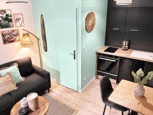 Appartements Emeraude Duplex : photos des chambres