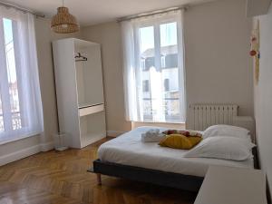 Appartements Grand appartement lumieux avec parquet : photos des chambres