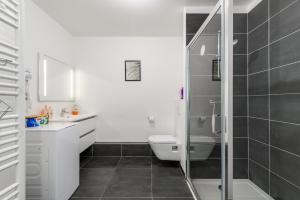 Appartements L-Ambre - T2 Lumineux - Parking, RER A, Disneyland : photos des chambres