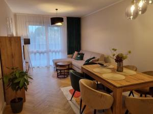 Apartament 55 z miejscem w garażu