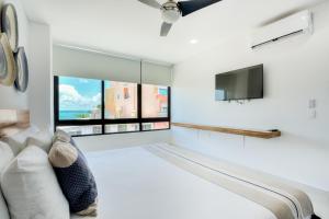 Departamento en Zona Hotelera con acceso a alberca en rooftop