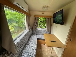 Campings Mobil-home Vintage au bord de la riviere : photos des chambres
