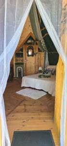 B&B / Chambres d'hotes La Chaumiere magique des Elfes et ses enigmes : photos des chambres