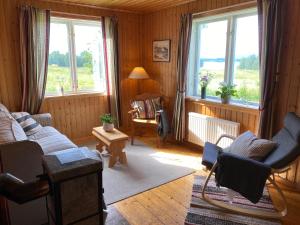 Lapplands lilla Gästhuset med båtuthyrning - Lapplands kleines Gästehaus mit Bootsverleih