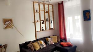 Appartements La maison des artistes plein centre familiale : photos des chambres