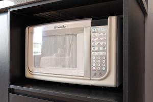 Studio minimalista e completo na Frei Caneca