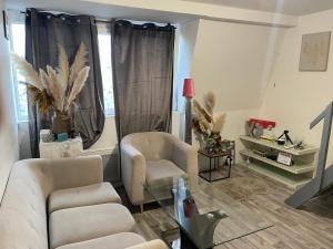 Sejours chez l'habitant Chambre charmante : photos des chambres