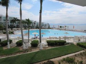 Beachfront Bliss at Aria Ocean Flamingos