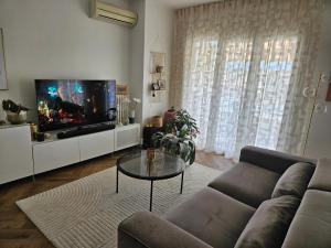 Appartement rénové dernier étage en ville et au calme