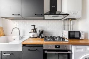 Appartements 2 pieces style industriel : photos des chambres