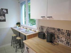 Appartements Appartement familial et cozy - Wifi - Espace Travail- Parking : photos des chambres