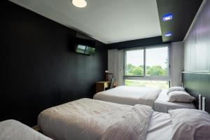 Hotels Hotel La Rocade : photos des chambres
