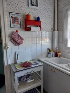 Appartements Style Vintage chic a 20 M de la plage : photos des chambres