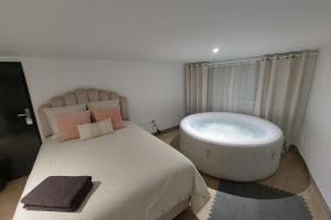 Appartements L08 Jacuzzi 5 Etoile par Villa Dengous : photos des chambres