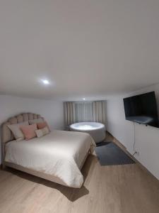 Appartements L08 Jacuzzi 5 Etoile par Villa Dengous : photos des chambres