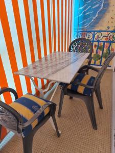 Appartements Style Vintage chic a 20 M de la plage : photos des chambres