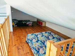 Appartements Maison de vacances : photos des chambres