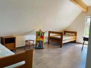 Maisons de vacances Chez L en Alsace Maison independante 8 pers Jardin & Cour privative : photos des chambres